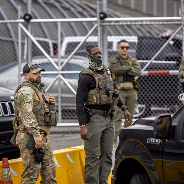 Police stand guard as faith groups continue to protest at...