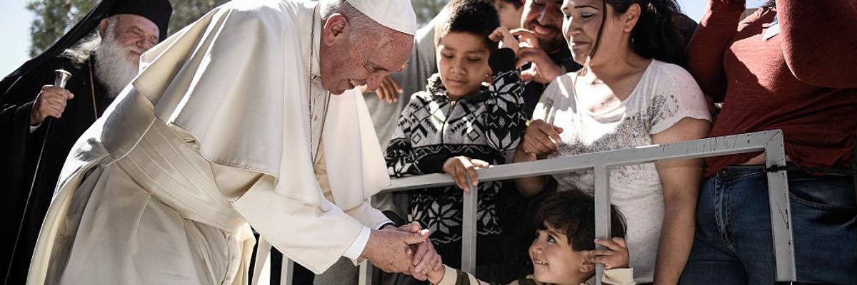 Pope Francis meets with migrants