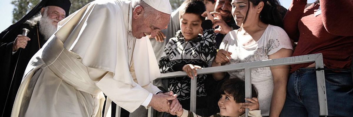 Pope Francis meets with migrants