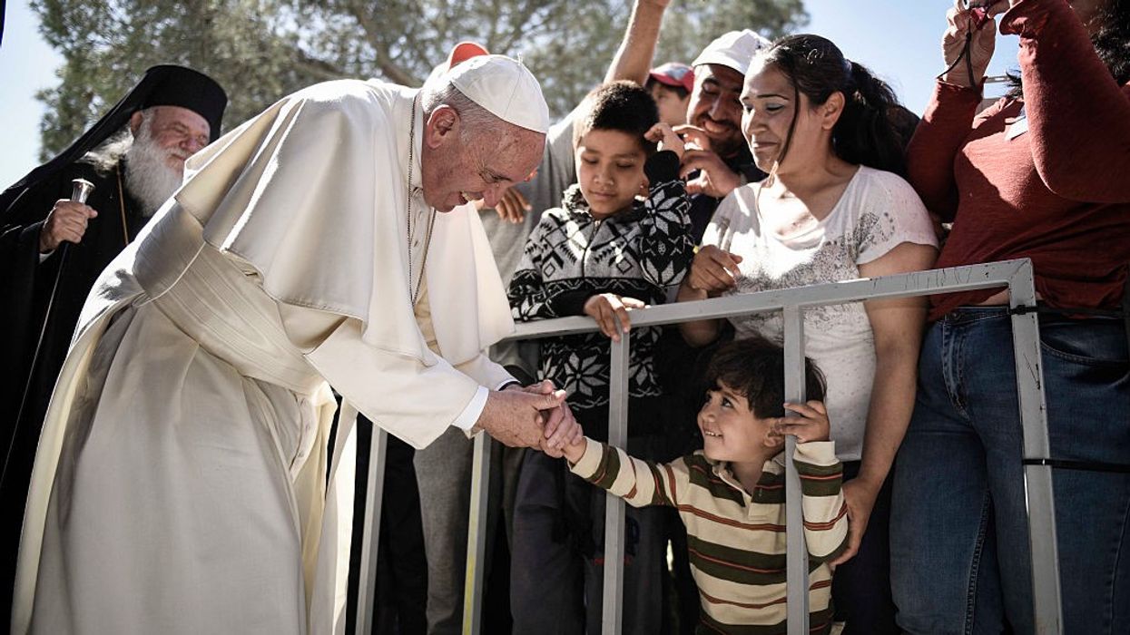 Pope Francis meets with migrants