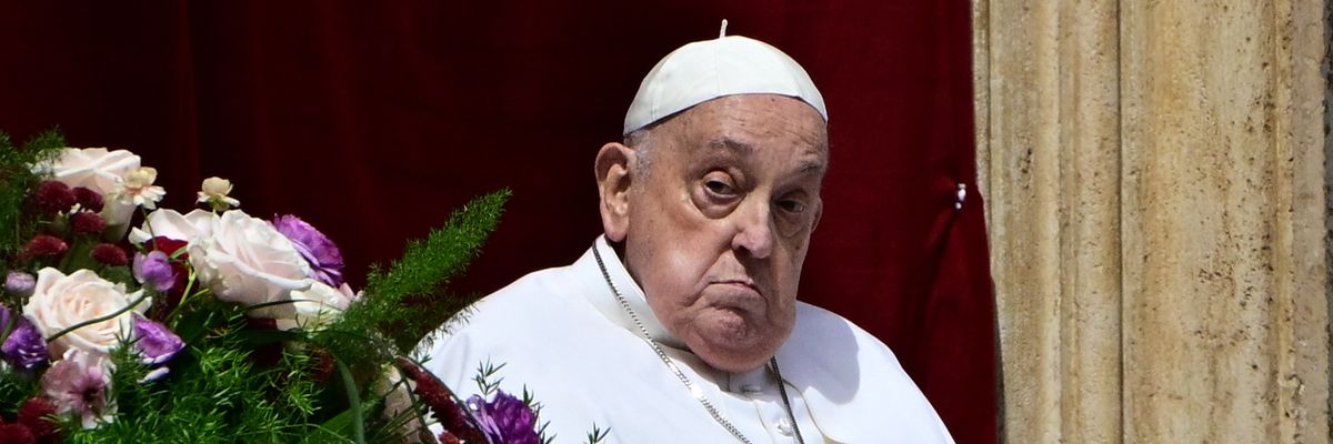 Pope Francis stands on the main balcony of St. Peter's basilica at St Peter's Square in the Vatican