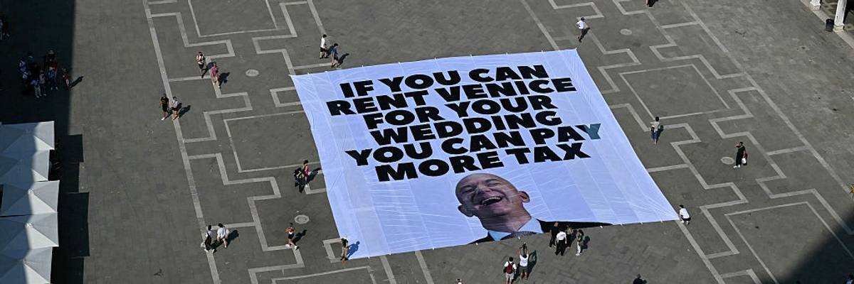 Poster protesting Bezos' Venice wedding.