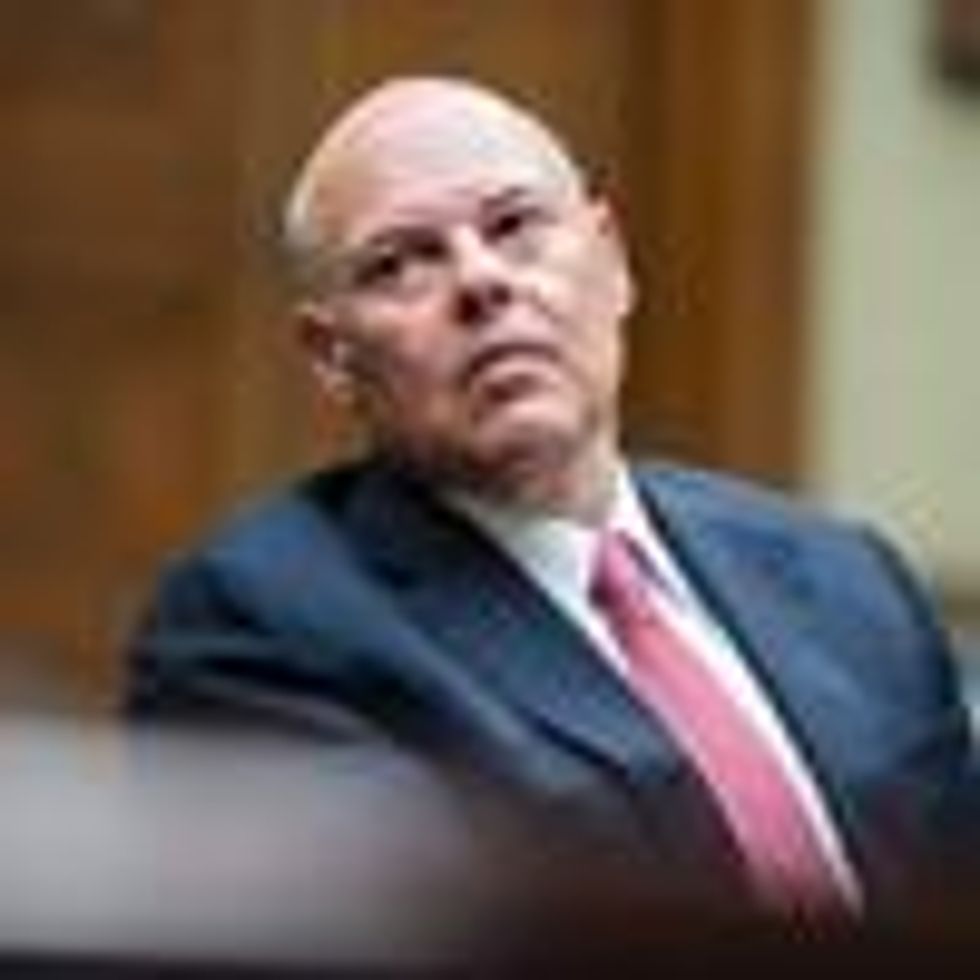 Postmaster General Louis DeJoy appears at a hearing