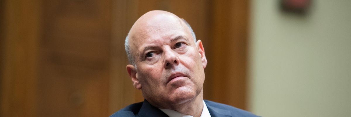 Postmaster General Louis DeJoy appears at a hearing