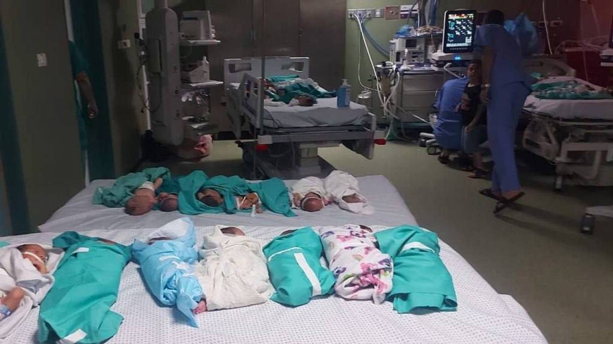 Premature babies on a bed in Gaza.