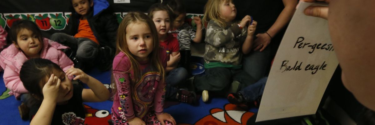 Preschool children attend a Head Start class