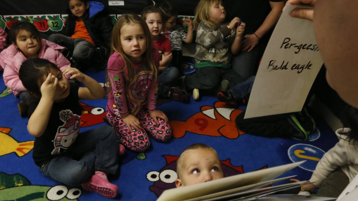 Preschool children attend a Head Start class