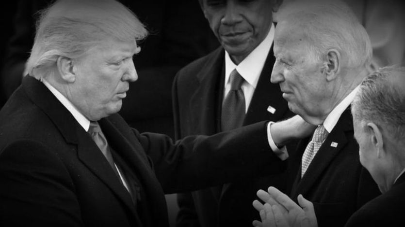 President Donald J. Trump shakes hands with Former vice president Joe Biden as Former president Barack Obama looks on at the inauguration of President Donald J. Trump on January 20, 2017