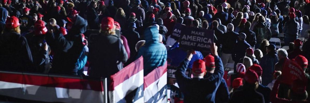 "It's a Superspreader Event": Few Masks in Sight at Packed Trump Campaign Rally in Michigan