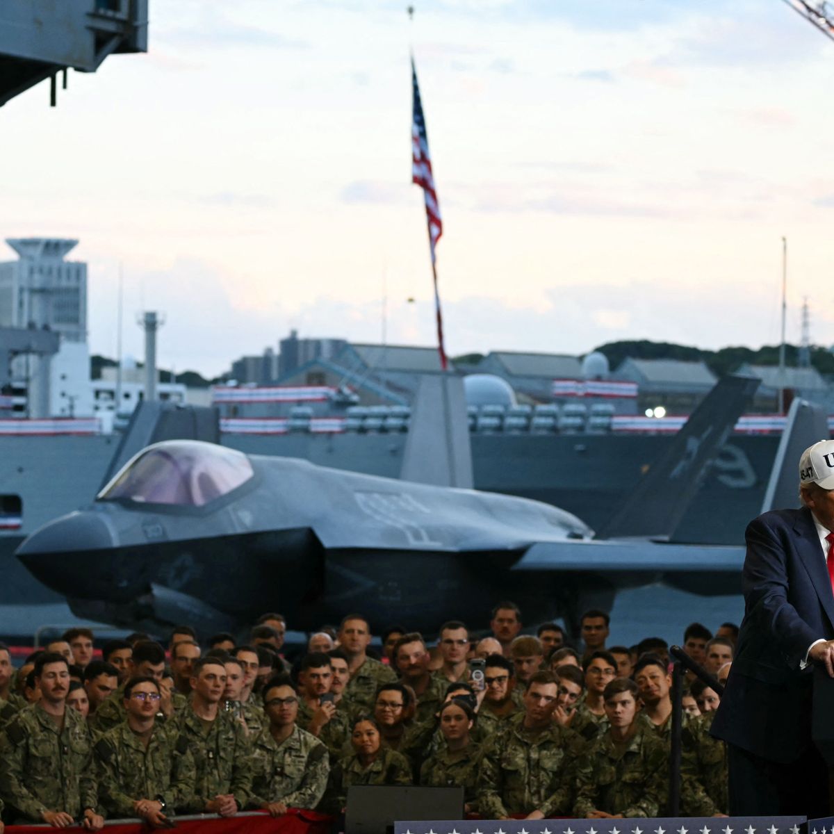 President Donald Trump delivers a speech in front of US Navy personnel