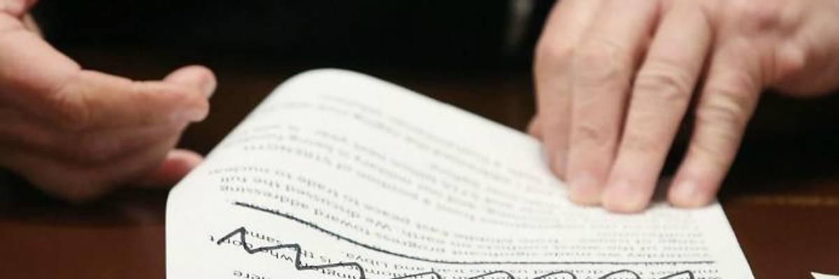 'Appalling': Sure Looks Like Trump Crossed Out Line Calling for Election Meddlers to Be Brought to Justice