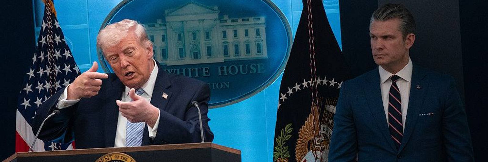 president-donald-trump-mimics-firing-a-r