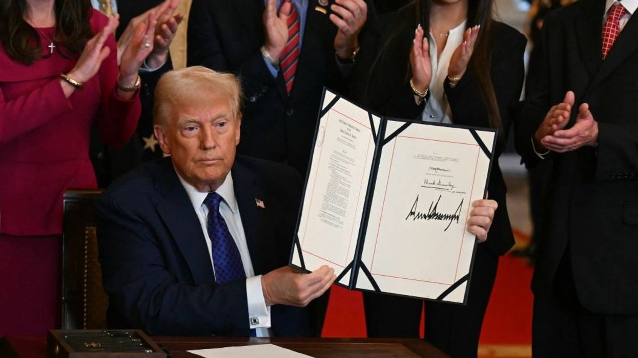 President Donald Trump signs the Laken Riley Act into law