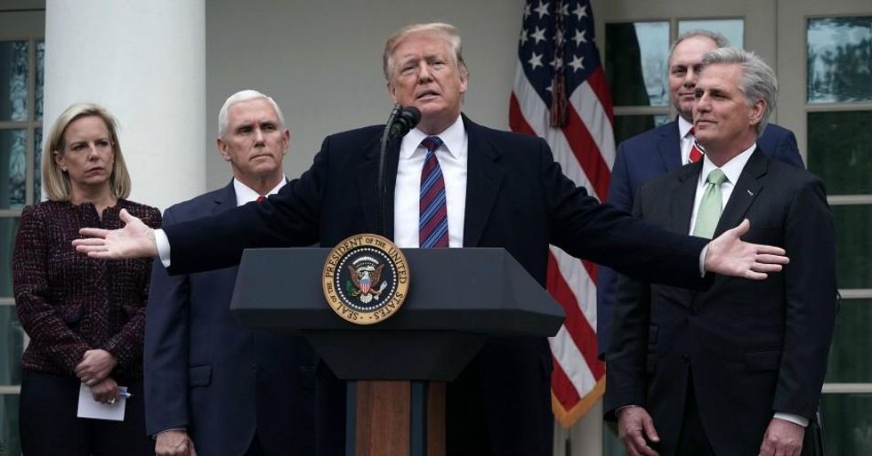 President Donald Trump speaks as Secretary of Homeland Security Kirstjen Nielsen, Vice President Mike Pence, House Minority Whip Rep. Steve Scalise (R-La.), and House Minority Leader Rep. Kevin McCarthy (R-Calif.) listen in the Rose Garden of the White House on January 4, 2019 in Washington, D.C. (Photo: Alex Wong/Getty Images)