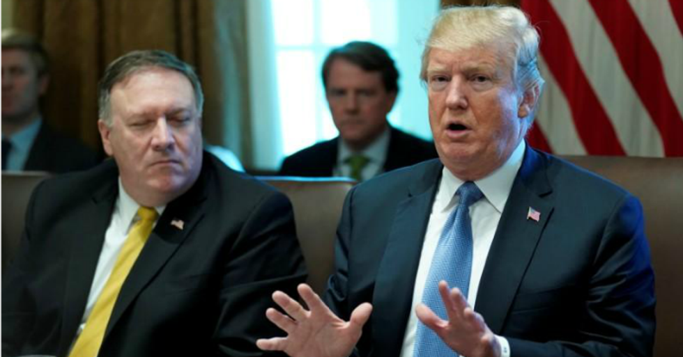 President Donald Trump speaks as Secretary of State Mike Pompeo listens during a cabinet meeting at the White House in Washington, U.S. June 21, 2018. (Photo: Jonathan Ernst/Reuters)