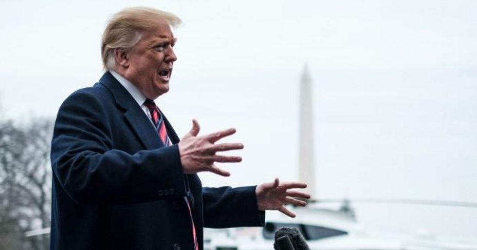 President Donald Trump stops to speak to reporters as he prepared to board Marine One on the South Lawn of the White House on January 19, 2019 in Washington, D.C. (Photo: Pete Marovich/Getty Images)