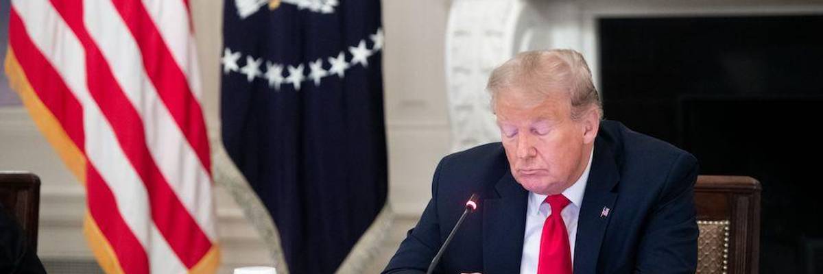 'Get Off Your Phone': Watch Trump Scroll Through Phone as Small Business Owner Describes Covid-19 Struggles