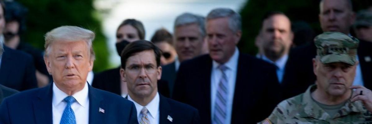 President Donald Trump walks with Secretary of Defense Mark Esper, Chairman of the Joint Chiefs of Staff Mark Milley, and others from the White House to visit St. John's Church on June 1, 2020, in Washington, D.C.