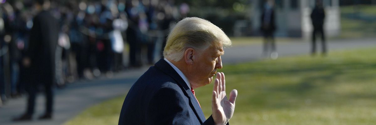 President Donald Trump waves to the media outside the White House on January 12, 2021 in Washington, D.C.