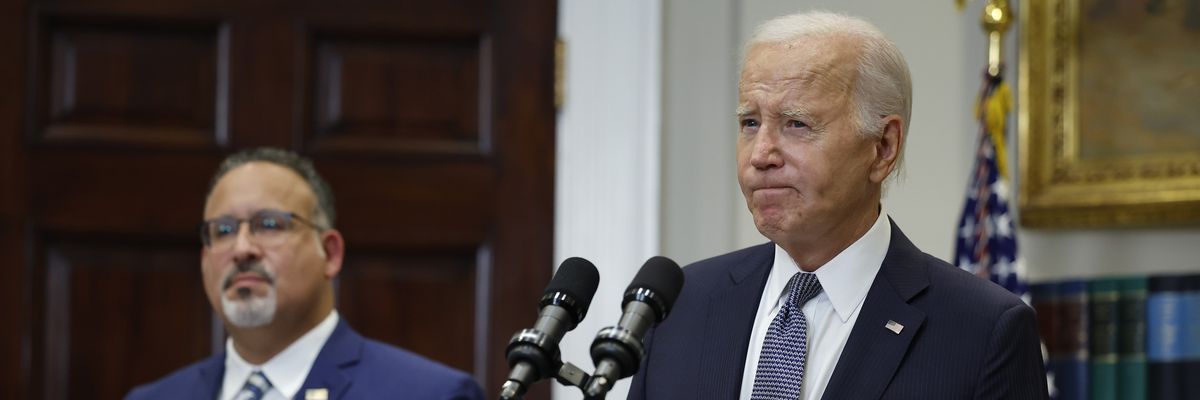 President Joe Biden and Education Secretary Miguel Cardona at a press conference
