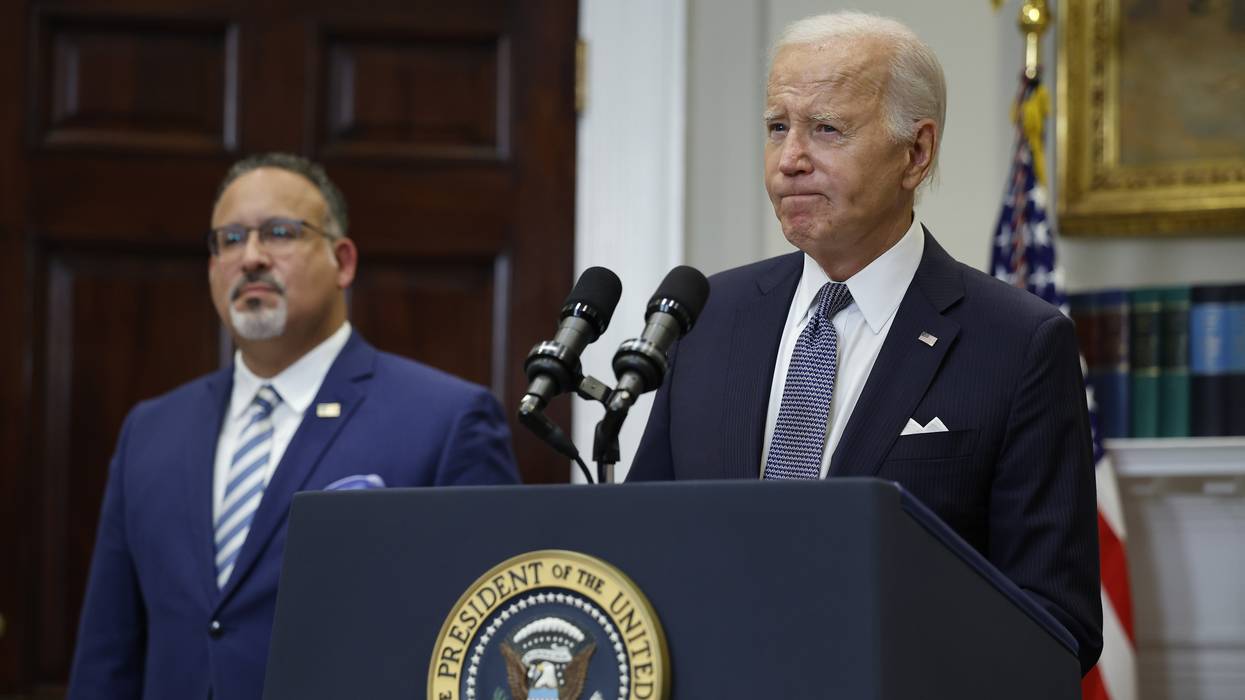 President Joe Biden and Education Secretary Miguel Cardona at a press conference