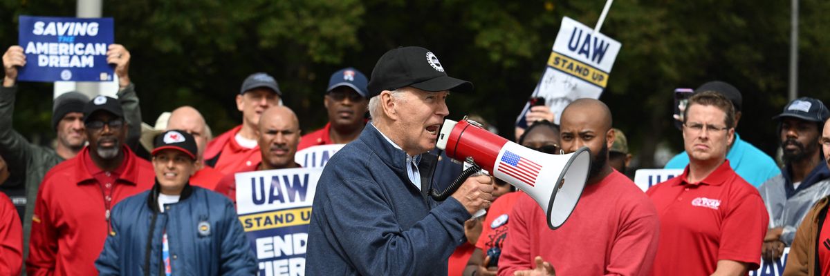 President Joe Biden and striking UAW workers