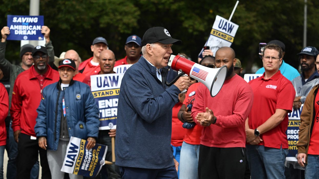 President Joe Biden and striking UAW workers