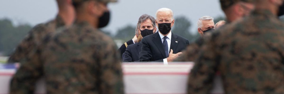 President Joe Biden attends the dignified transfer of the remains of fallen service members at Dover Air Force Base