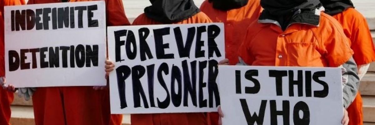 Amnesty Calls on Biden to Close Guantanamo and End Military Commissions 'Once and For All'