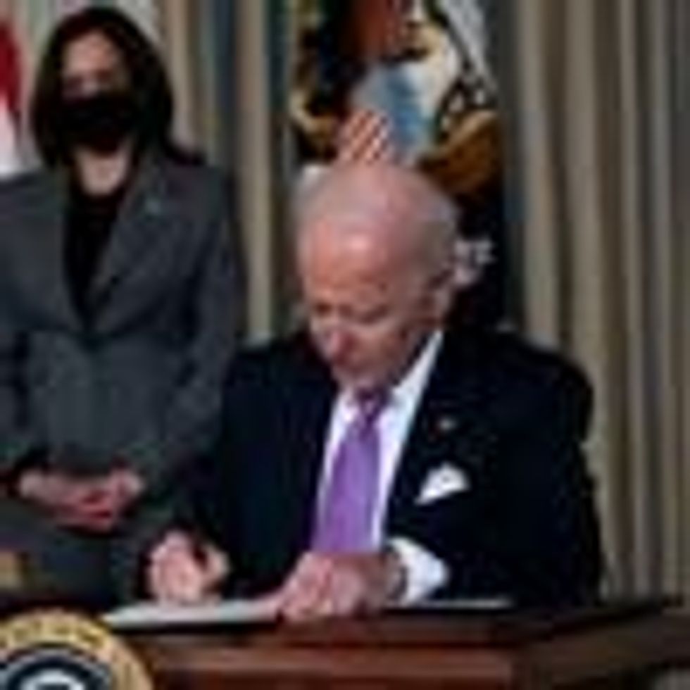 President Joe Biden signed a series of racial justice executive orders and memoranda at the White House on January 26, 2021. (Photo: Dog Mills/Getty Images)