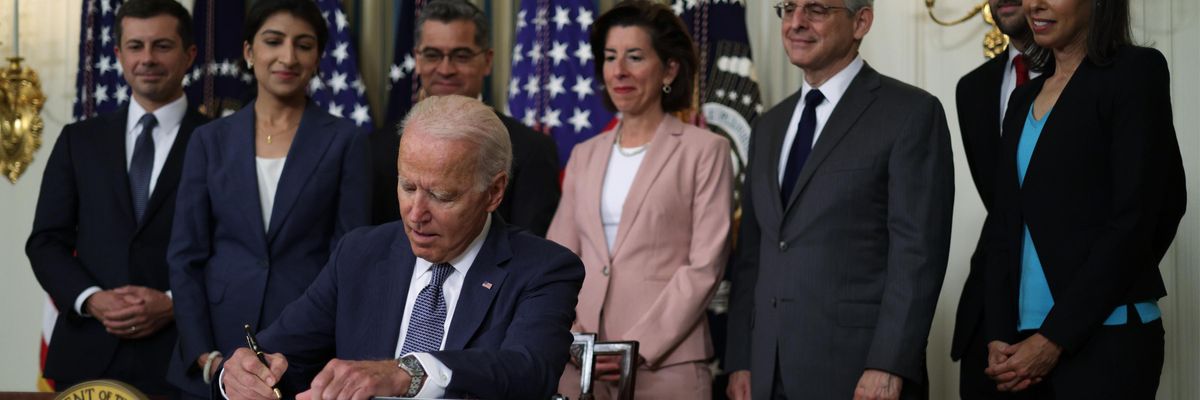 President Joe Biden signs an executive order
