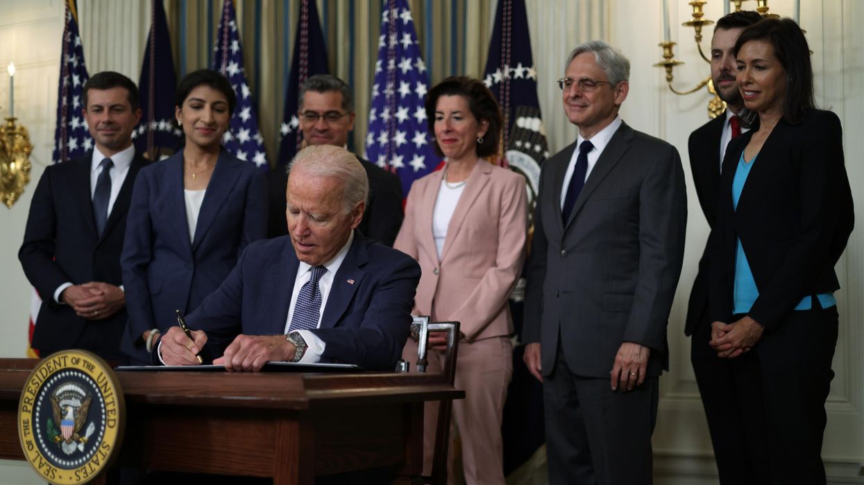President Joe Biden signs an executive order