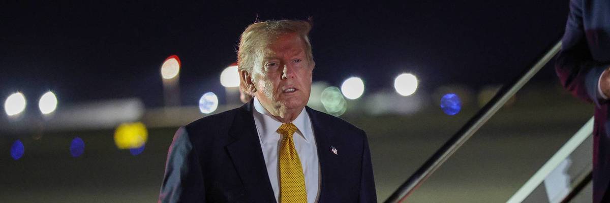President Trump Aboard Air Force One Stops At Royal Air Force Mildenhall En Route Back From NATO Summit In Turkey