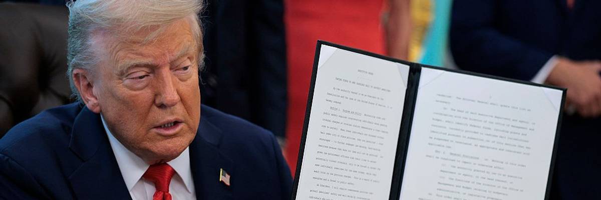 President Trump Signs Executive Orders In The Oval Office Of The White House
