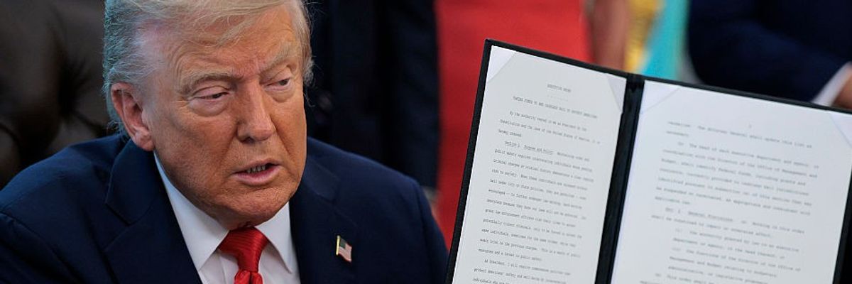 President Trump Signs Executive Orders In The Oval Office Of The White House