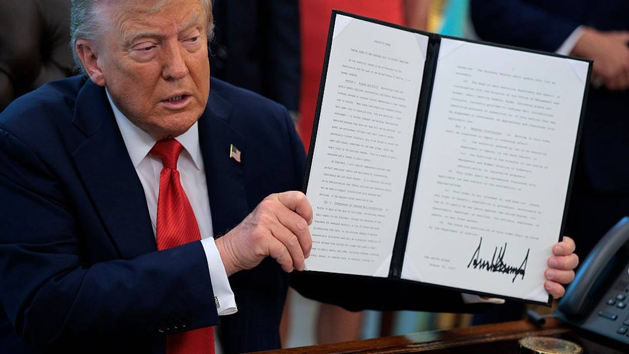 President Trump Signs Executive Orders In The Oval Office Of The White House