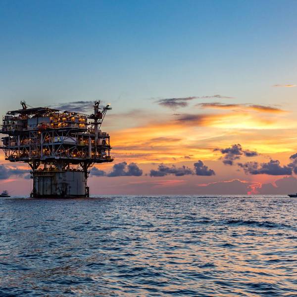 Private fishing boats near offshore petroleum drilling rig in the Gulf of Mexico