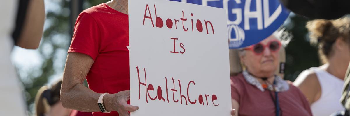 Pro-abortion and anti-abortion protesters confronted on 2nd anniversary of high court's abortion ruling in D.C.
