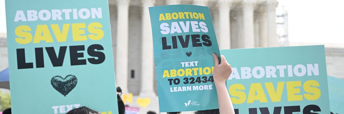 Pro-abortion rights activists rally outside the U.S. Supreme Court