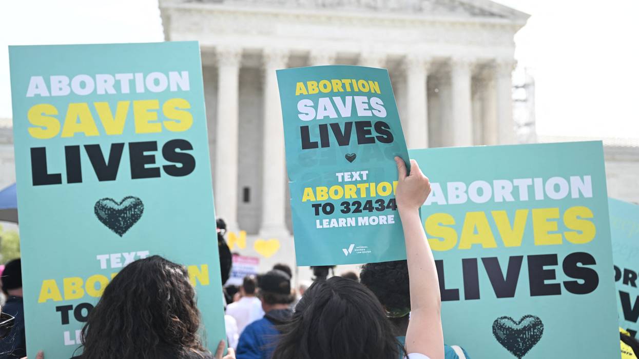 Pro-abortion rights activists rally outside the U.S. Supreme Court