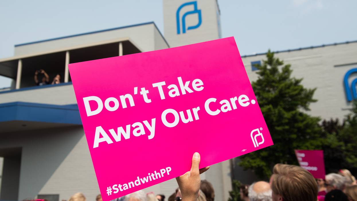 Pro-choice supporters and staff of Planned Parenthood hold a rally
