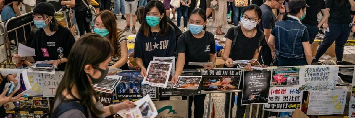 Concerns Over Police Brutality Persist as Hong Kong Protesters Shut Down One of World's Busiest Airports