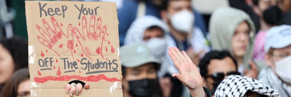 Pro-Palestine demonstrators gather in front of Columbia University