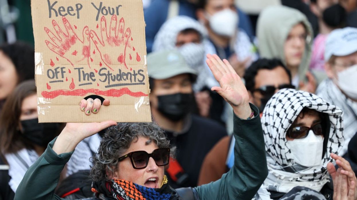 Pro-Palestine demonstrators gather in front of Columbia University