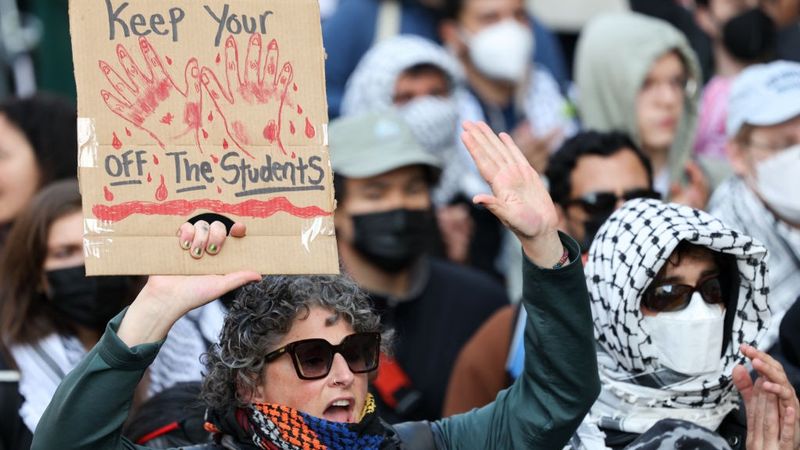 Pro-Palestine demonstrators gather in front of Columbia University