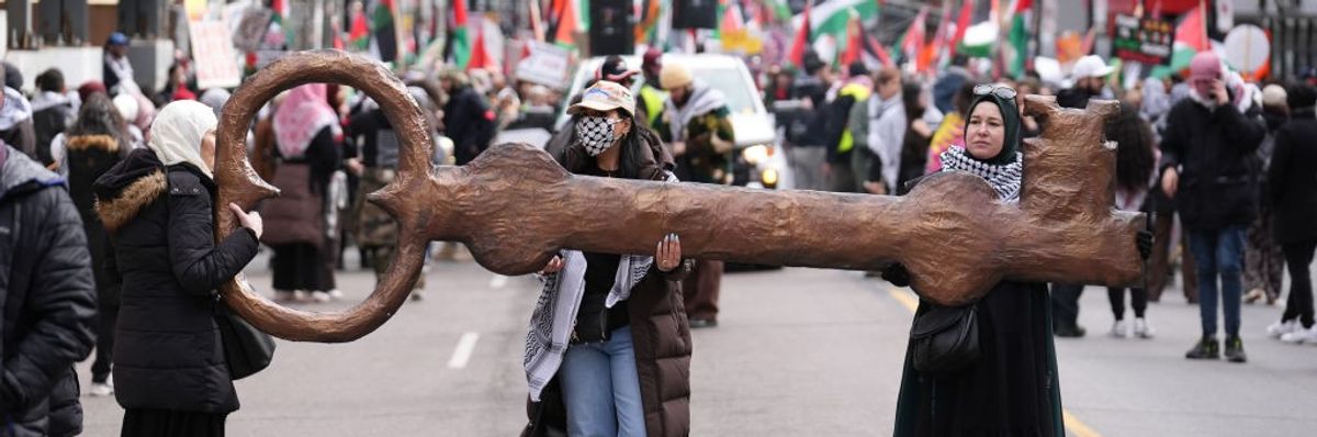 Pro-Palestinian demonstrators march during a rally, on the 48th anniversary of the March 30 Palestinian Land Day, in Toronto, Ontario on March 30, 2023.