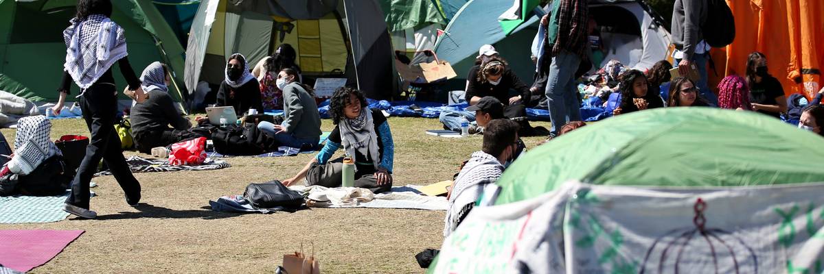 Pro-Palestinian students and activists gather at a protest encampment