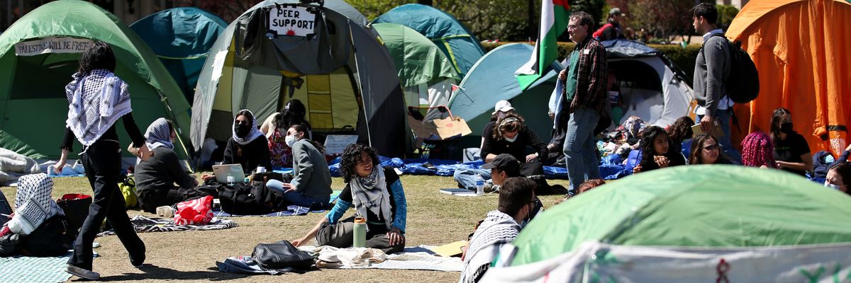 Pro-Palestinian students and activists gather at a protest encampment