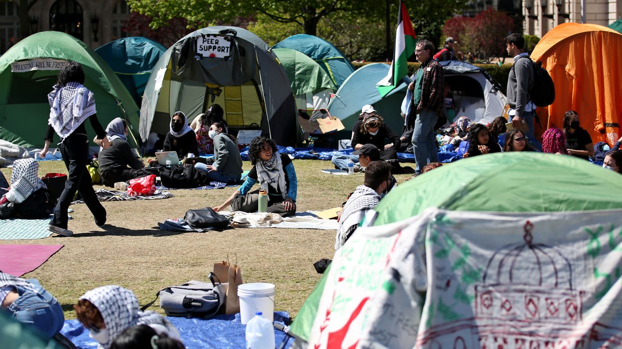 Pro-Palestinian students and activists gather at a protest encampment