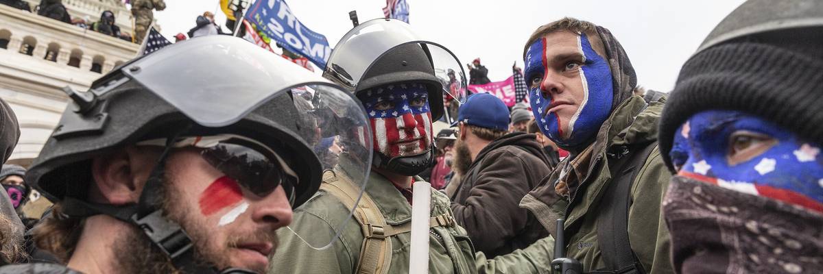 Pro-Trump protesters trying to enter Capitol building.